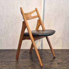 Anker Dining Chair Black Leather in teak natural finish