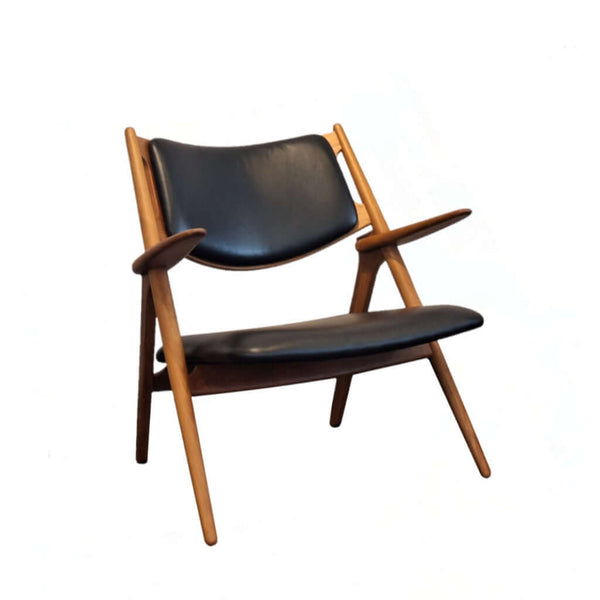 Anker Lounge Chair Black Leather seat and backrest in teak natural finish