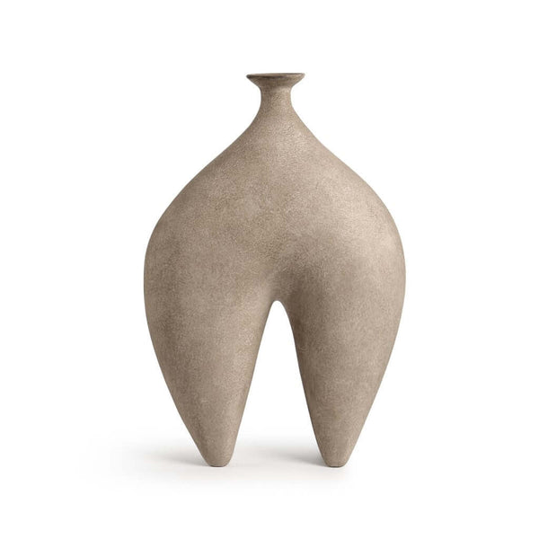 A beige, handcrafted ceramic vase with an abstract shape