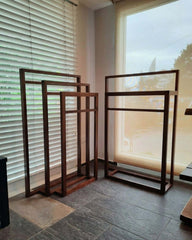 A walnut Belut Hanger 2-Tier & Belut Hanger 3-Tier with a simple straight-line silhouette, intended for drying towels or hanging clothing.