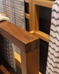 Close up of a walnut Belut Hanger 2-Tier with a simple straight-line silhouette, intended for drying towels or hanging clothing.