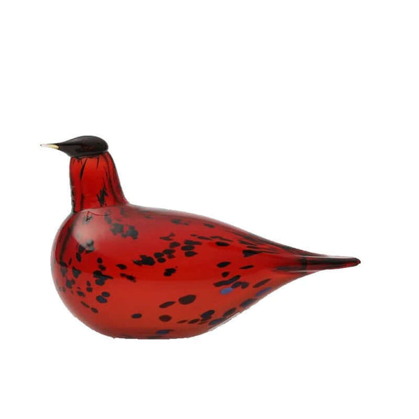 Birds By Toikka Ruby Bird Cranberry is a red glass bird figurine with black speckles.