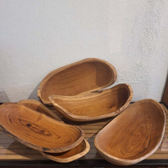 Handcrafted Bread Bowl Large Teak in a natural boat form with flowing grain and organic detailing. Each piece is unique, bringing warmth and character to any table setting or interior.