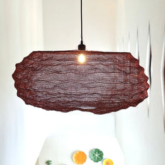 Handwoven pendant light made of copper wire mesh in copper finish
