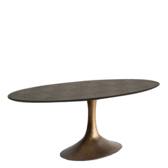 Oval-shaped aluminium Eclipse Dining Table with blackish bronze finish top and antique brass finish base 