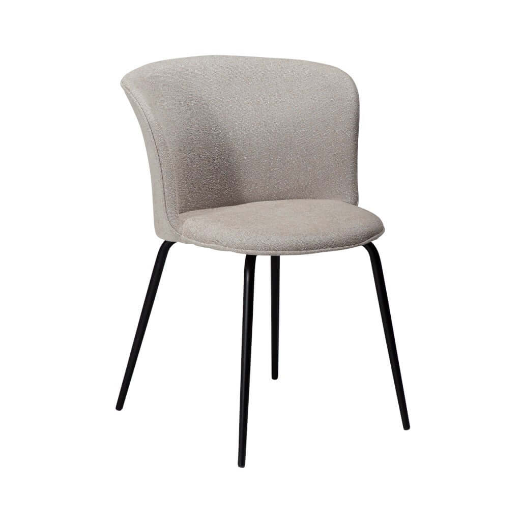An off white fabric upholstered dining chair with a curved backrest and straight, conical metal legs.