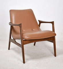 Eyes Lounge Chair Tan Leather with teak armrests and legs