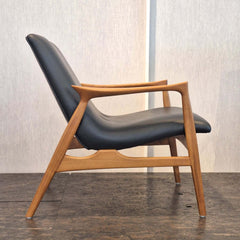 Eyes Lounge Chair Black Leather seat and backrest in natural teak finish