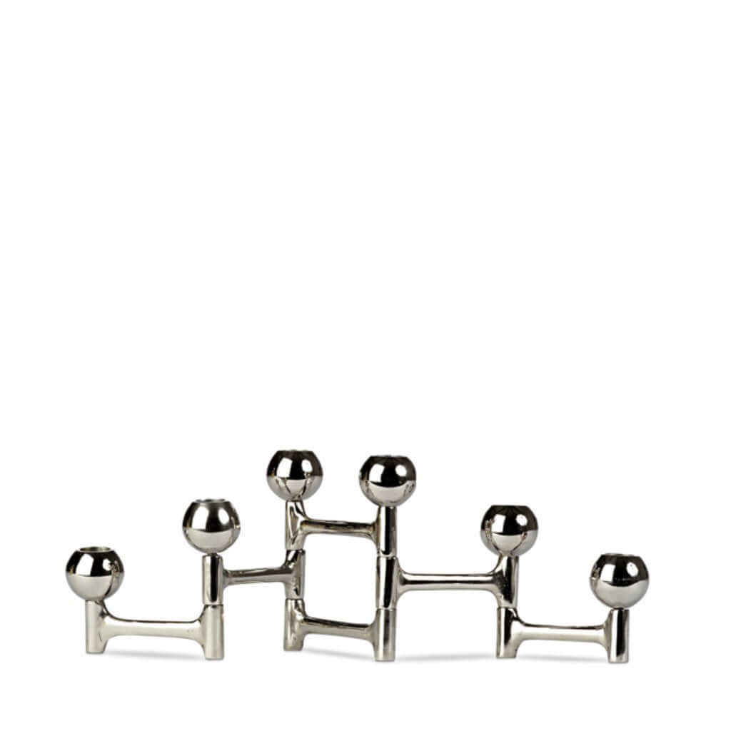 A silver Round Folding Candle Holder with a stylish square detailing and classic lines.