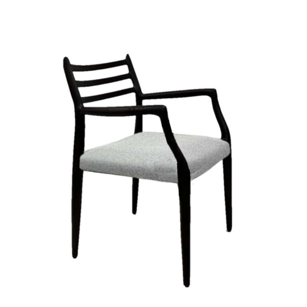 A black solid ash wood frame dining chair with a light grey upholstered seat and backrest.