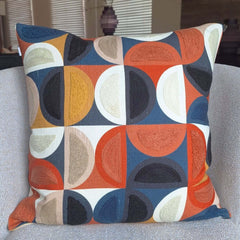 Hemi Embroidered Cushion showcasing vibrant colors and intricate stitching details.