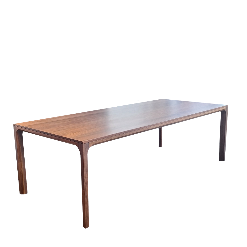 Solid walnut dining table with 4 slim legs at each corner
