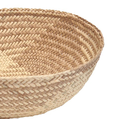 Close-up of a Handmade Iraca Small Bowl Square Toasted basket, made in Colombia