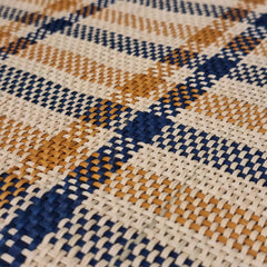 close up of a Iraca Rectangle Placemat Blue Toasted Natural handmade in colombia