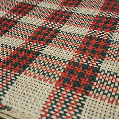 Close-up of a Iraca Rectangle Placemat Green Red Natural handmade in colombia