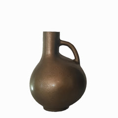 Jug Shaped Aluminium Vase 25cm Antique Brass is suitable for placing on a shelf or tabletop.