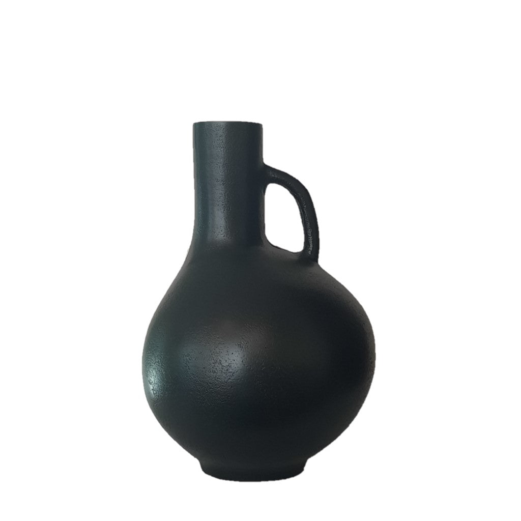 Jug Shaped Aluminium Vase 33cm Blackish Bronze is suitable for use as a decorative piece on a shelf or tabletop.