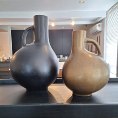 A pair of Jug Shaped Aluminium Vases in blackish bronze and antique brass finish