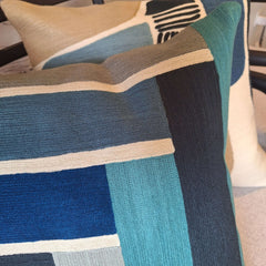 Keano Embroidered Cushion showcasing vibrant colors and intricate stitching details.