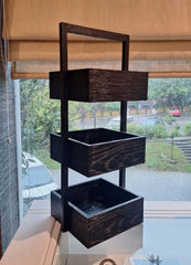 Ash wood three-tiered shelf suitable for storage. 