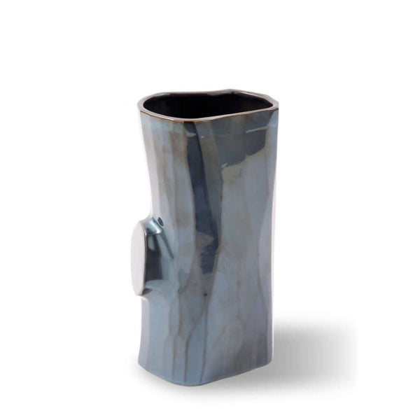 Blue ceramic vase with a unique design by Pols Potten