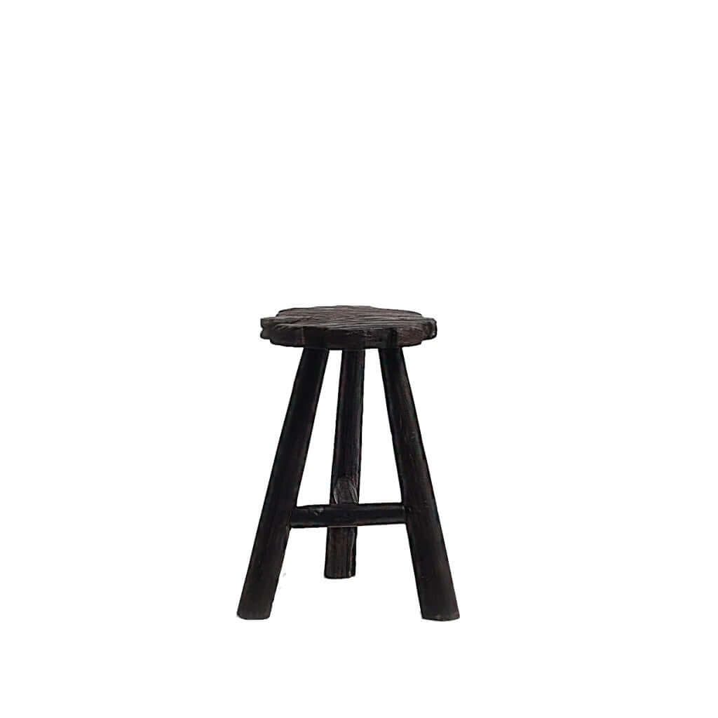 Black wooden Medewi Stool made of aged teak