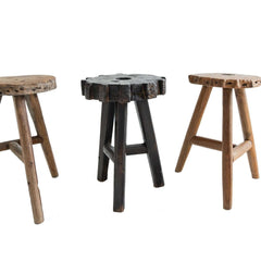 Black wooden Medewi Stool made of aged teak