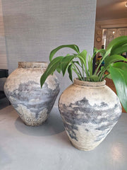 Ceramic Metis Floor Vase with a rustic finish. The vase has a glazed interior and a hand-brushed exterior with black and beige tones.