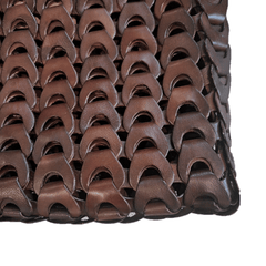 NS Link Tote Bruciato crossbody handbag with a textured, chain-like pattern made from recycled buffalo leather.