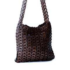 NS Link Tote Bruciato crossbody handbag with a textured, chain-like pattern made from recycled buffalo leather.