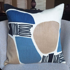 Neptu Embroidered Cushion showcasing vibrant colors and intricate stitching details.