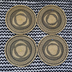Baba Tree Handwoven Round Placemat 00005 with black and natural pattern made of elephant grass in Ghana