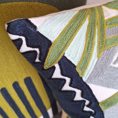 Pinna Embroidered Cushion featuring intricate stitching and vibrant colors, perfect for adding style to any home decor.