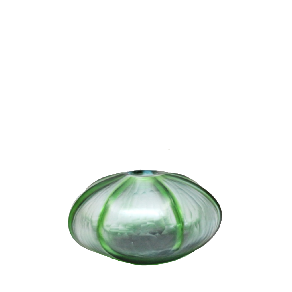 Rockpool Vase 10cm in luminous pearl-white glass, its smooth green-edged ribs fanning outward like the segments of a sea urchin. The iridescent surface shifts between silver, white and soft green as the light moves around it.