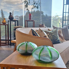 Rockpool Vase 10cm with a rounded, dome-like shape, featuring a translucent white body with green ribbed accents 