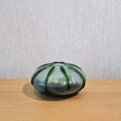 Rockpool Vase 10cm with a rounded, dome-like shape, featuring a translucent white body with green ribbed accents 