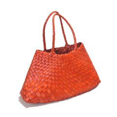 Dragon Diffusion Santa Croce Big Orange with asymmetric leather straps and a woven basket-like design.
