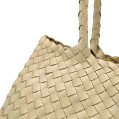 Dragon Diffusion Santa Croce Big Pearl with asymmetric leather straps and a woven basket-like design.