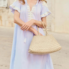Dragon Diffusion Santa Croce Big Pearl with asymmetric leather straps and a woven basket-like design.