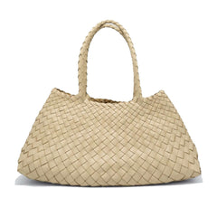Dragon Diffusion Santa Croce Big Pearl with asymmetric leather straps and a woven basket-like design.