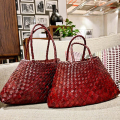 Dragon Diffusion Santa Croce Big Bordo and Small Bordo handbags on a couch
