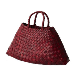 Dragon Diffusion Santa Croce Small Bordo with asymmetric leather straps and a woven basket-like design.