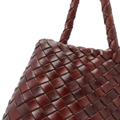 Dragon Diffusion Santa Croce Small Bruciato with asymmetric leather straps and a woven basket-like design.