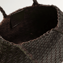 Dragon Diffusion Santa Croce Small Dark Brown with asymmetric leather straps and a woven basket-like design.