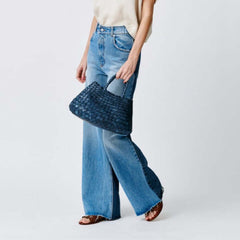 Dragon Diffusion Santa Croce Small Marine with asymmetric leather straps and a woven basket-like design.