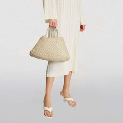 Dragon Diffusion Santa Croce Small Pearl with asymmetric leather straps and a woven basket-like design.