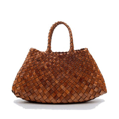 Dragon Diffusion Santa Croce Small Tan handbag with asymmetric leather straps and a woven basket-like design.