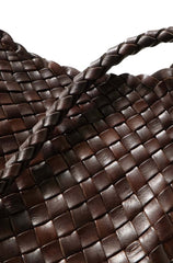 Close-up of Dragon Diffusion Santa Rosa Dark Brown leather woven cross-body shoulder handbag with long handles