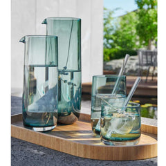 A family of green, mouth-blown Sarabi drinkware with a shiny finish, suitable for serving beverages, by ASA selection