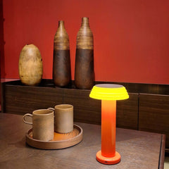 PL1 Portable Table Light Red-Yellow with a red base and yellow lampshade, designed by George Sowden.